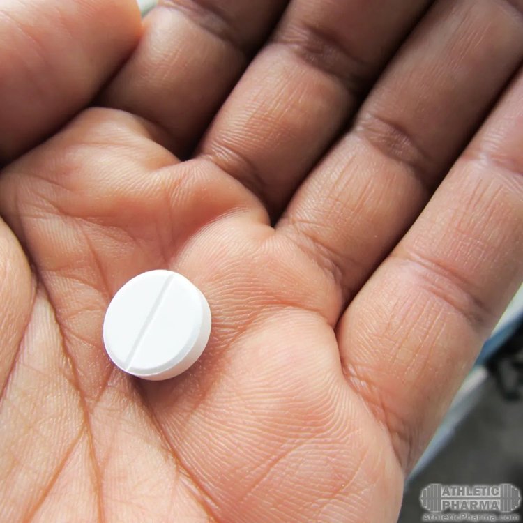 Белая круглая таблетка мелатонина